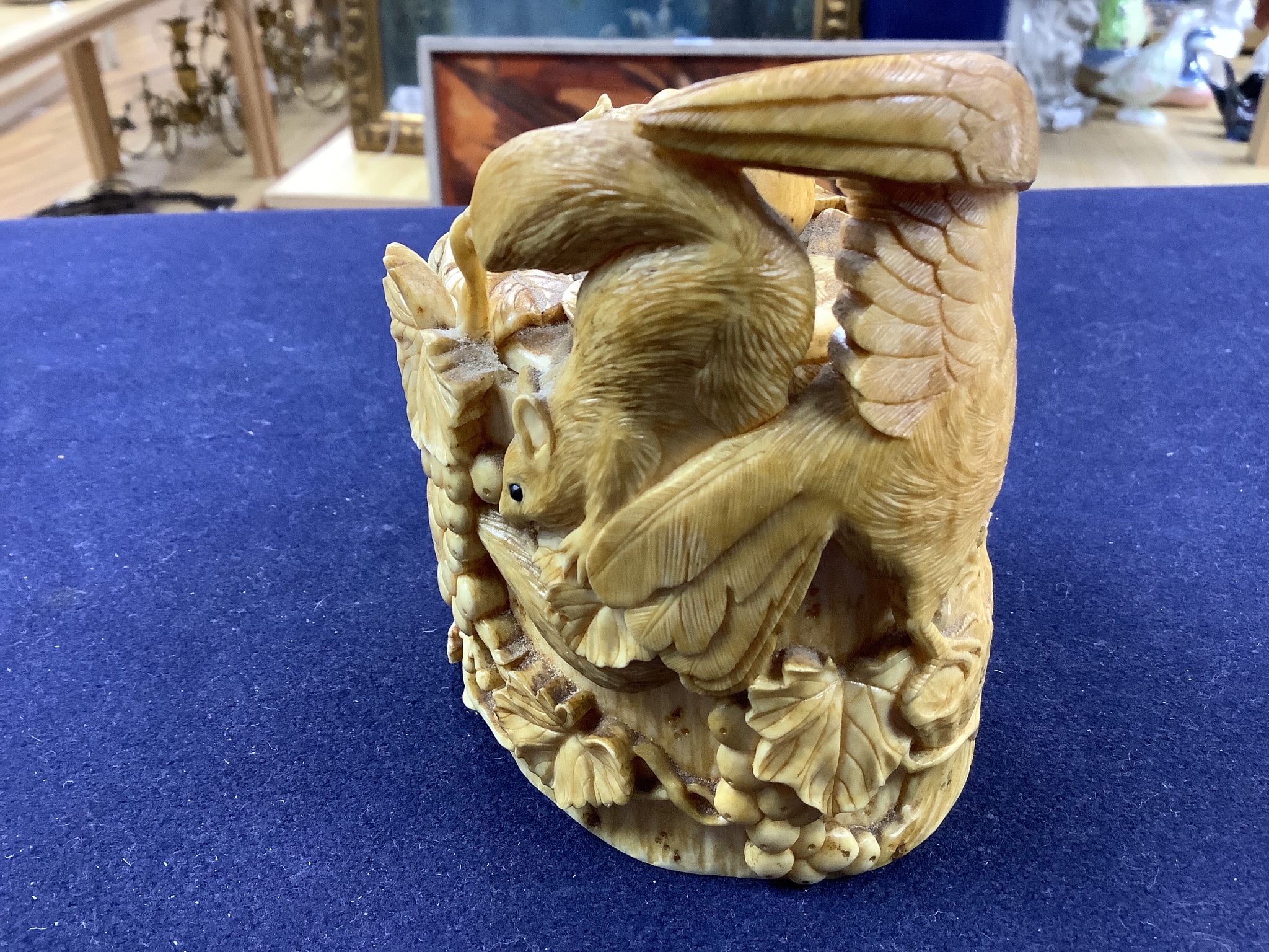 A Japanese ivory box carved with an eagle, frog and squirrels, Meijii period